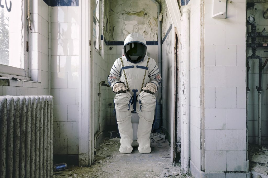 astronaut on toilet