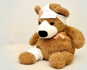 teddy bear with bandages wounds
